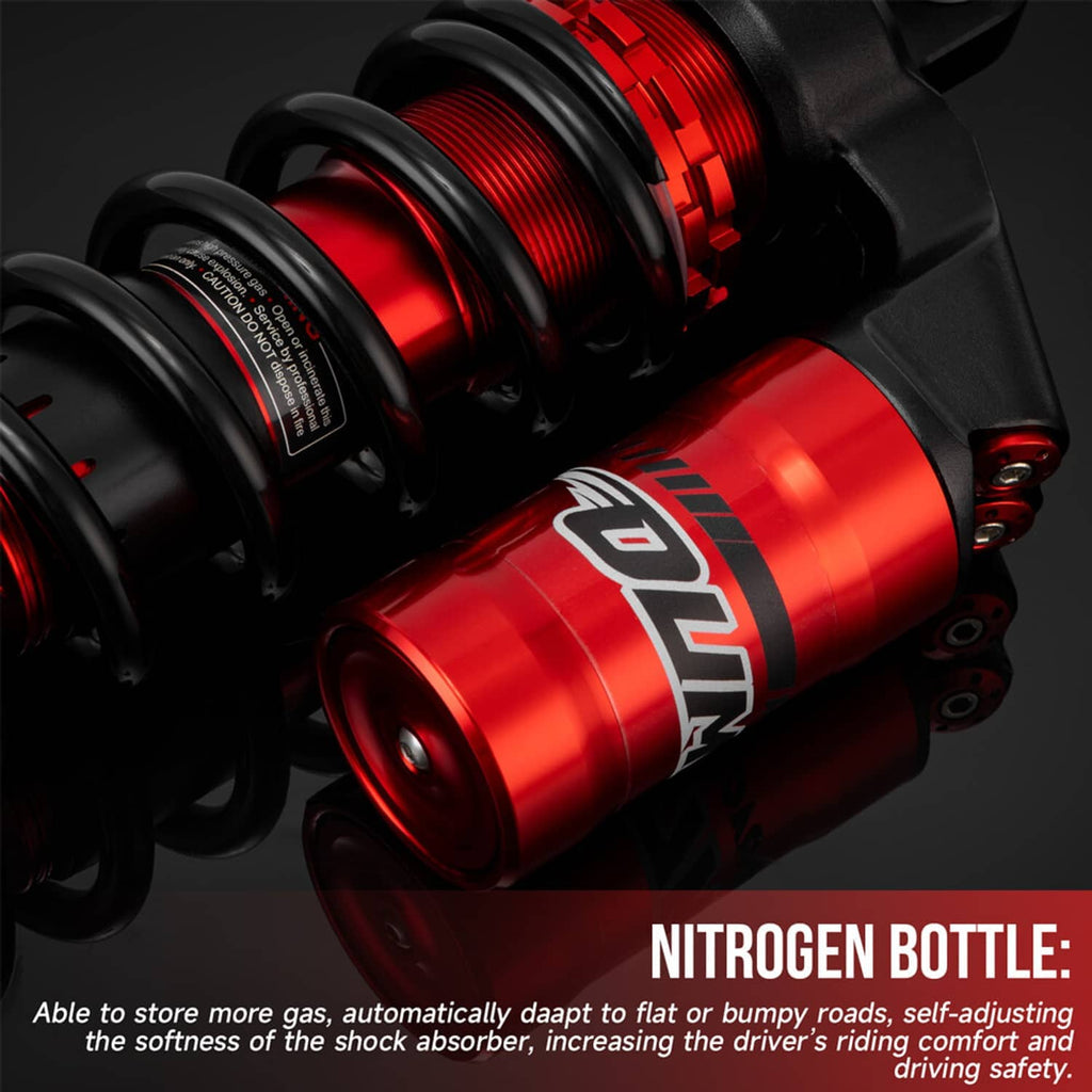 Close-up of red shock reservoirs with black springs and mounting hardware