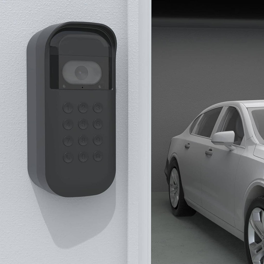 Black silicone cover for video keypad camera, wall mounted beside garage entrance