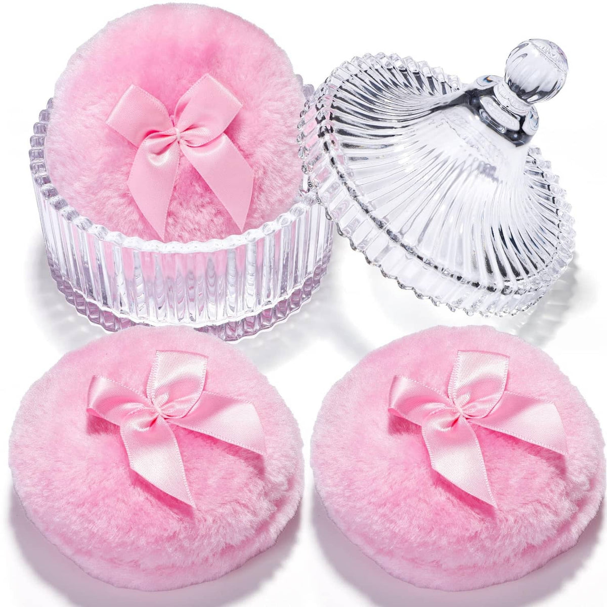 Pink fuzzy powder puff with satin bow, shown with matching clear container