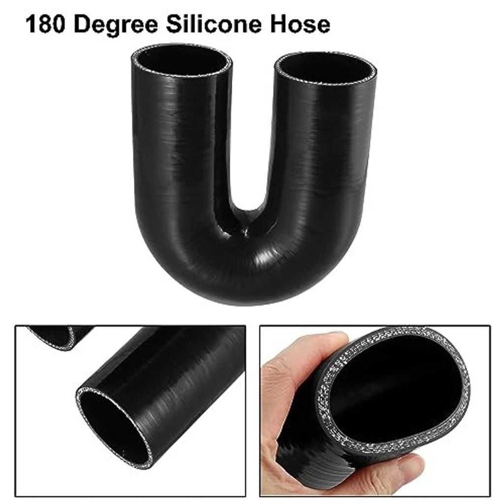 Black 180-degree silicone hose reducer with two open ends, hand-held close-up view.