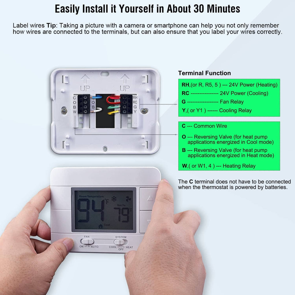 Thermostat with open wiring terminals behind the front panel and green LCD