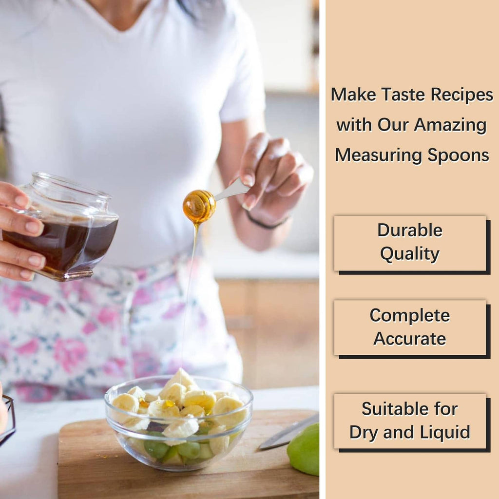Person using stainless steel measuring spoons to scoop honey from a glass jar