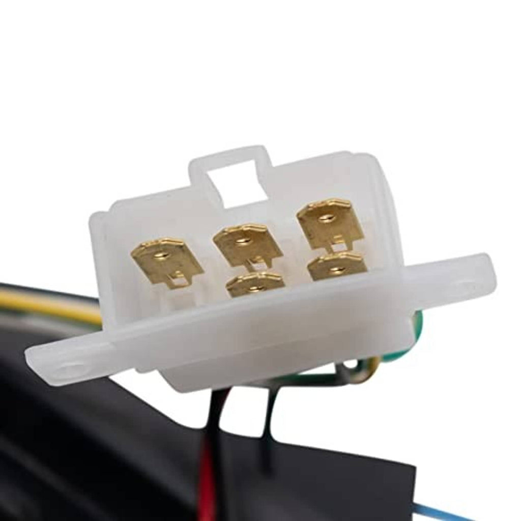 Close-up of LED tail light wiring connector with gold terminals on a white plug
