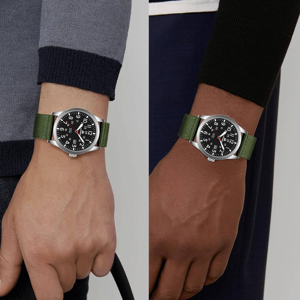 Men's military sport analog watch on wrist, black dial, green nylon strap, silver case