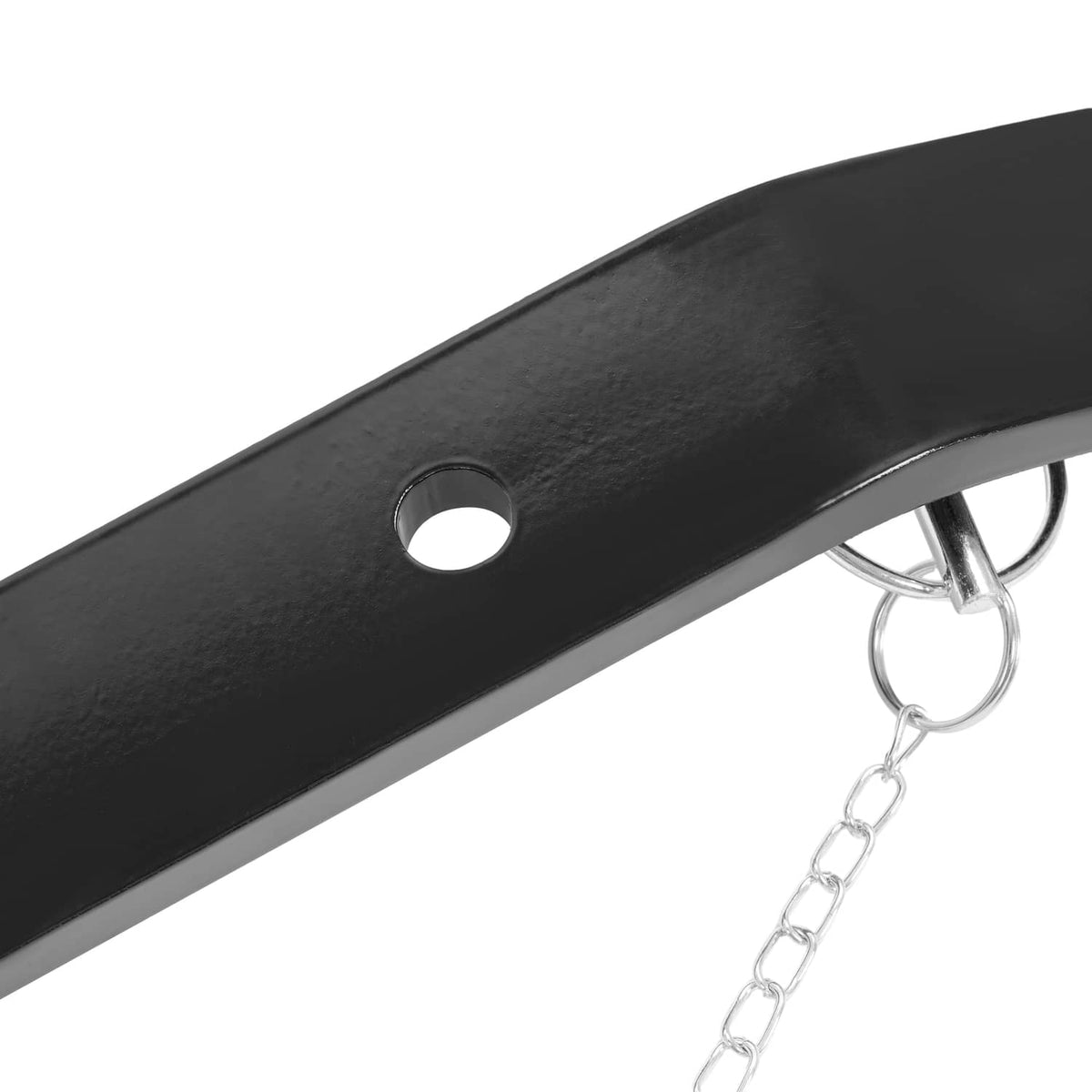 Close-up of black 3-point hitch lift arm with round mounting hole and chain attachment