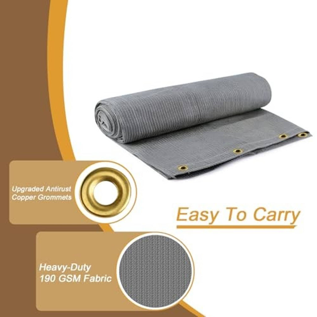 Rolled gray sun shade cloth with brass grommets and stitched edge binding