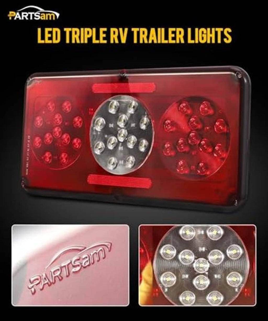 Red rectangular LED RV trailer tail light with central clear LED cluster and red lenses