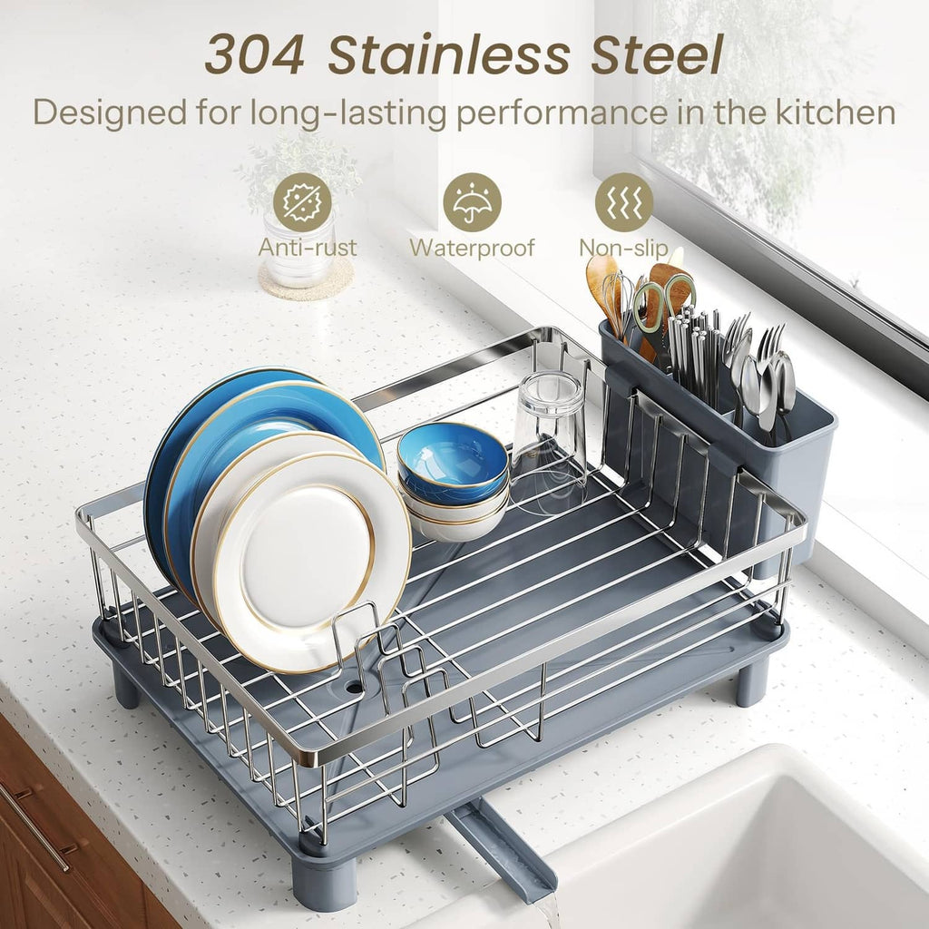 Stainless steel dish drying rack with stacked blue and white plates and cups