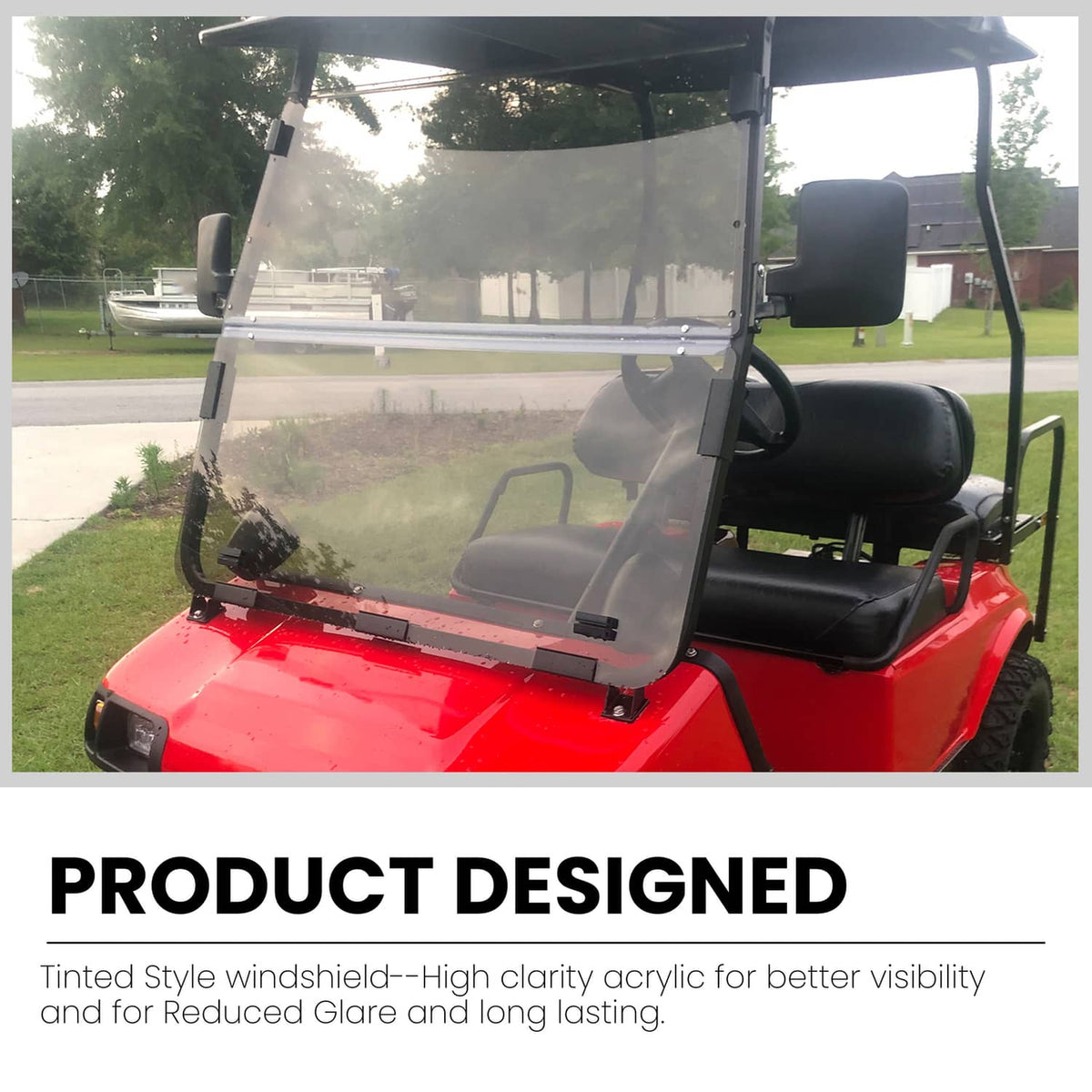 Tinted folding golf cart windshield installed on red cart, light smoke panel