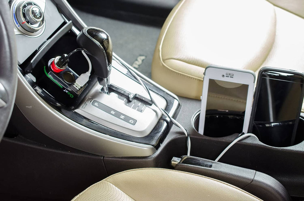 Goxt 12V dual USB car socket on console with connected cables and two round power ports
