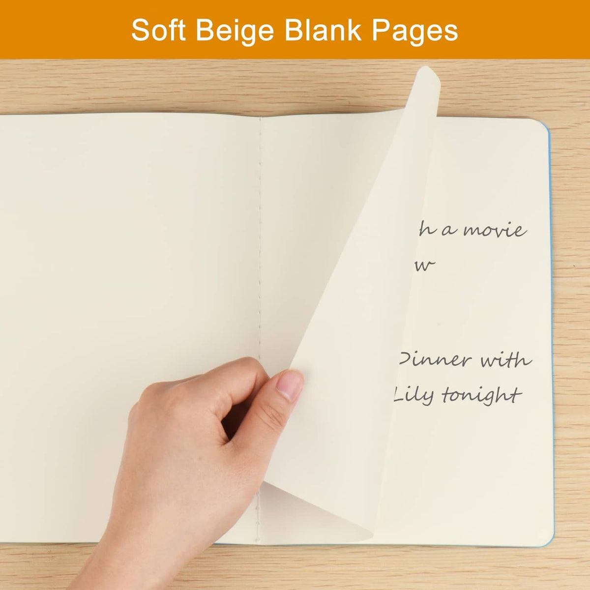 A5 notebook with soft beige blank pages, handwritten text on an inner page