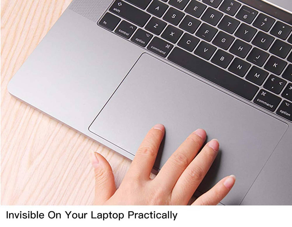 Clear trackpad protector film on a MacBook, nearly invisible under fingers across the trackpad.
