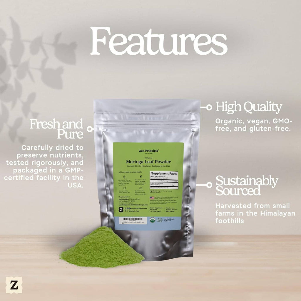 Moringa leaf powder silver pouch with green label, with small pile of green powder