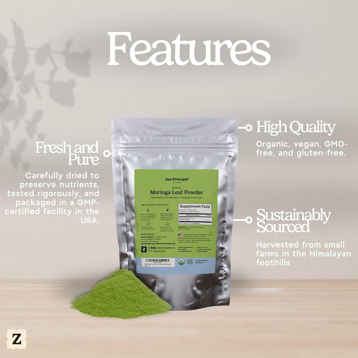 Moringa leaf powder silver pouch with green label, with small pile of green powder