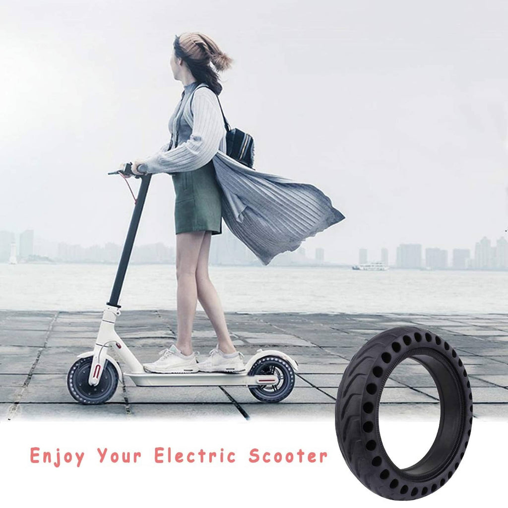 Black solid electric scooter wheel tire with deep tread pattern