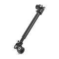 Black steering shaft with U-joints and mounting yokes, angled front view