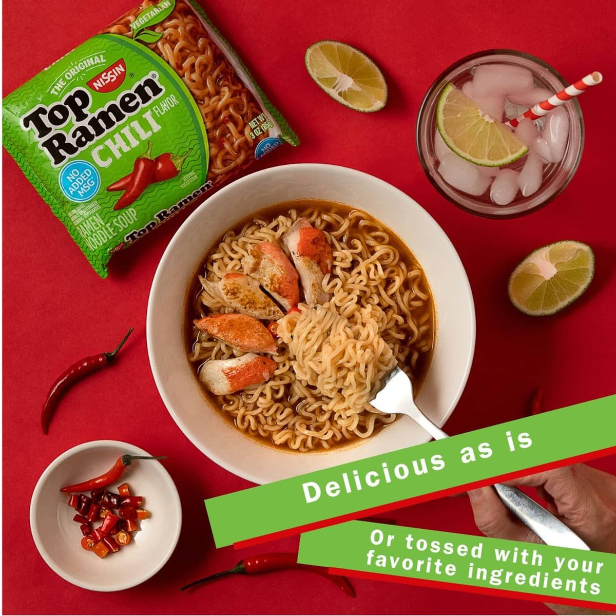 Prepared Top Ramen chili noodle soup in a bowl with chili and lime