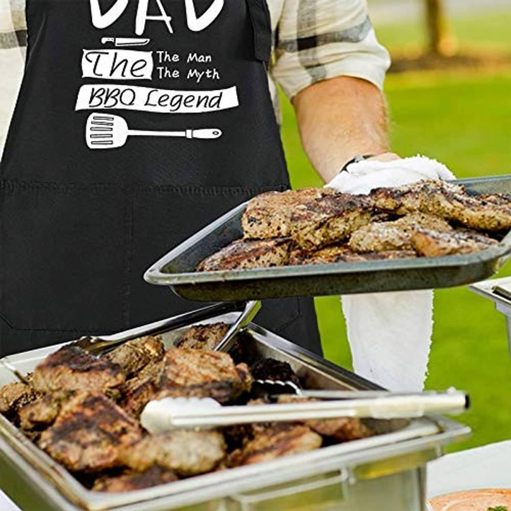 Black BBQ apron with 'DAD The Man The Myth BBQ Legend' print on the grill