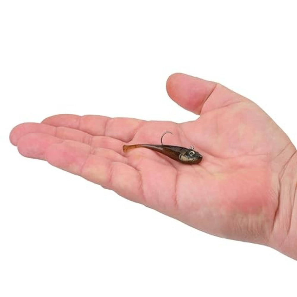 Dark green pumpkin soft plastic bait held in hand, with exposed hook