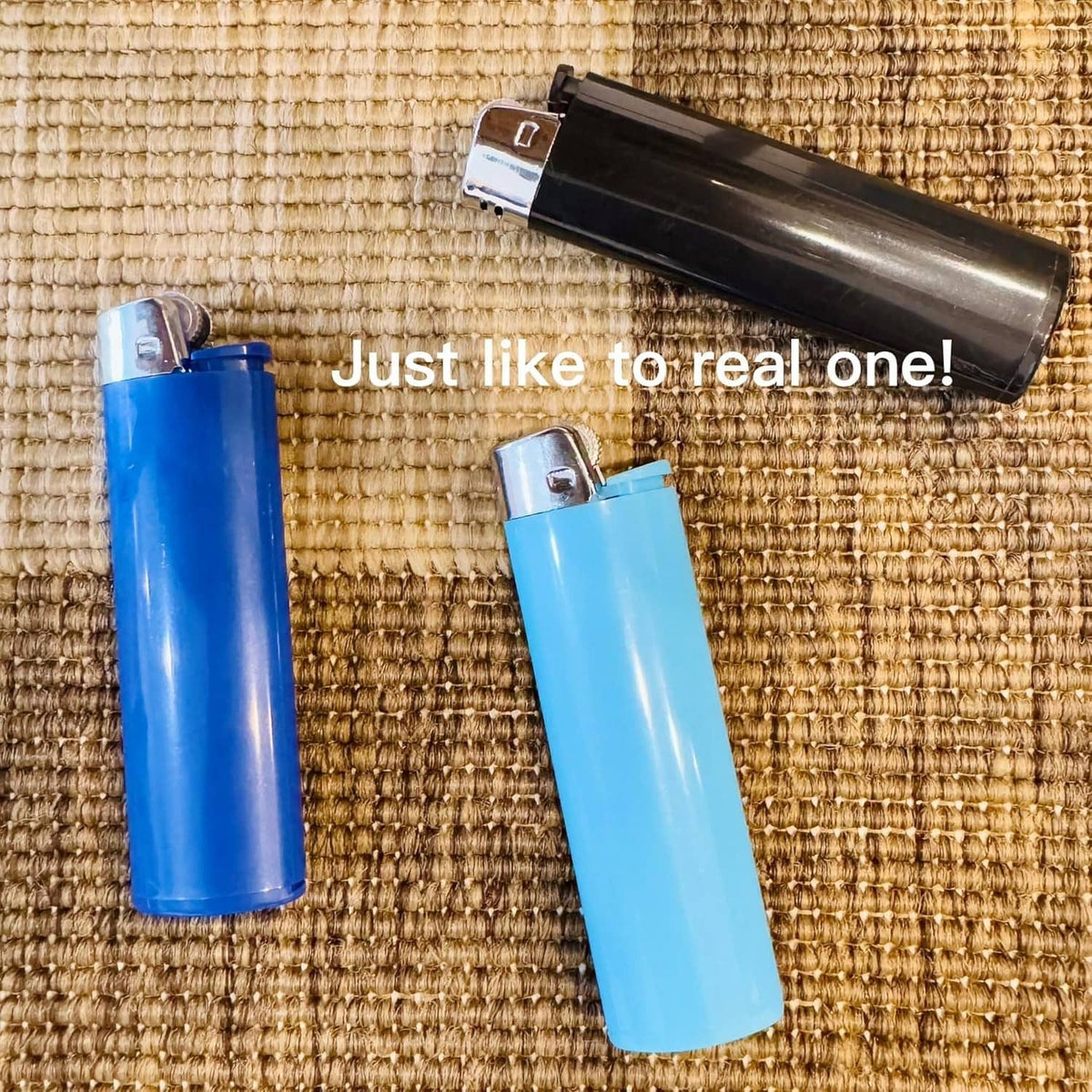 Diversion lighter with silver top and open stash compartment; blue lighter shown too.