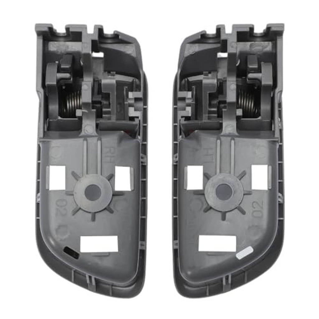Pair of gray interior door handles, back sides with mounting clips and spring