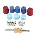 Air conditioning valve core kit with red and blue caps, metal valve cores, and tool
