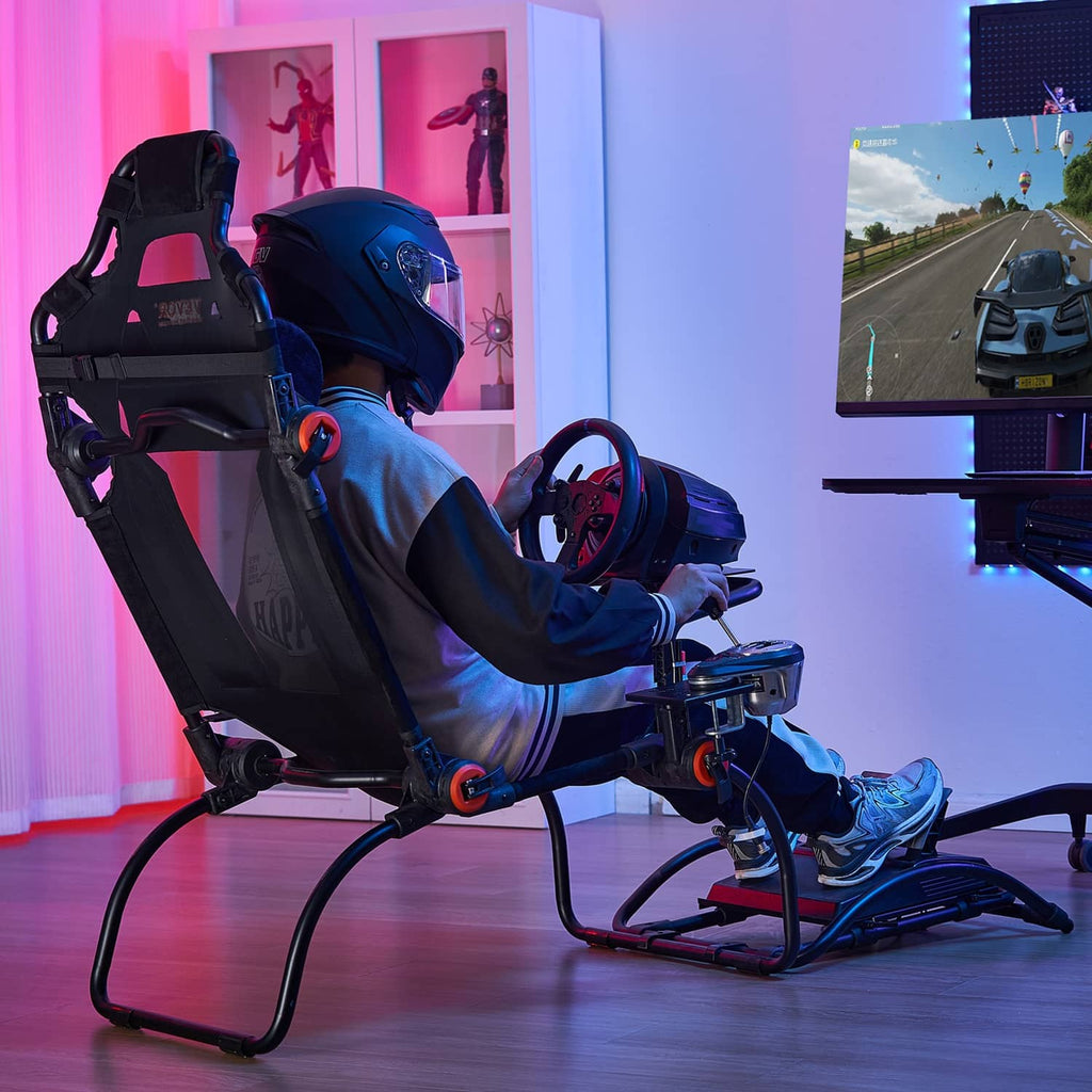 Racing simulator wheel stand setup with steering wheel and pedals on the black frame