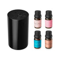 Black waterless essential oil diffuser with touch controls and top buttons.