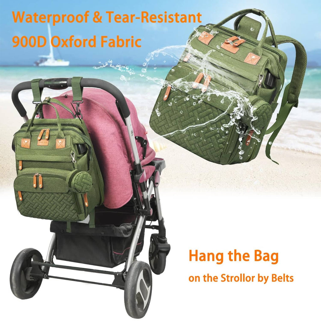 Green diaper bag with stroller straps, textured front panel and dual zipper pockets