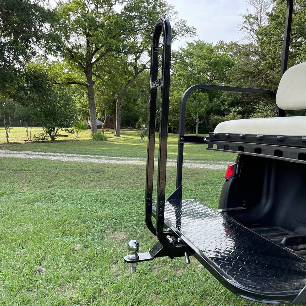 Installed black rear safety grab bar with diamond-plate footrest on golf cart