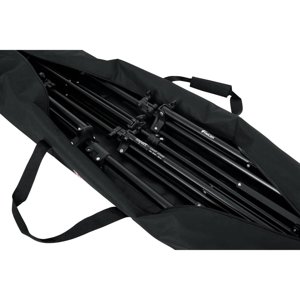 Open black carry bag showing metal stand legs and secure tie straps