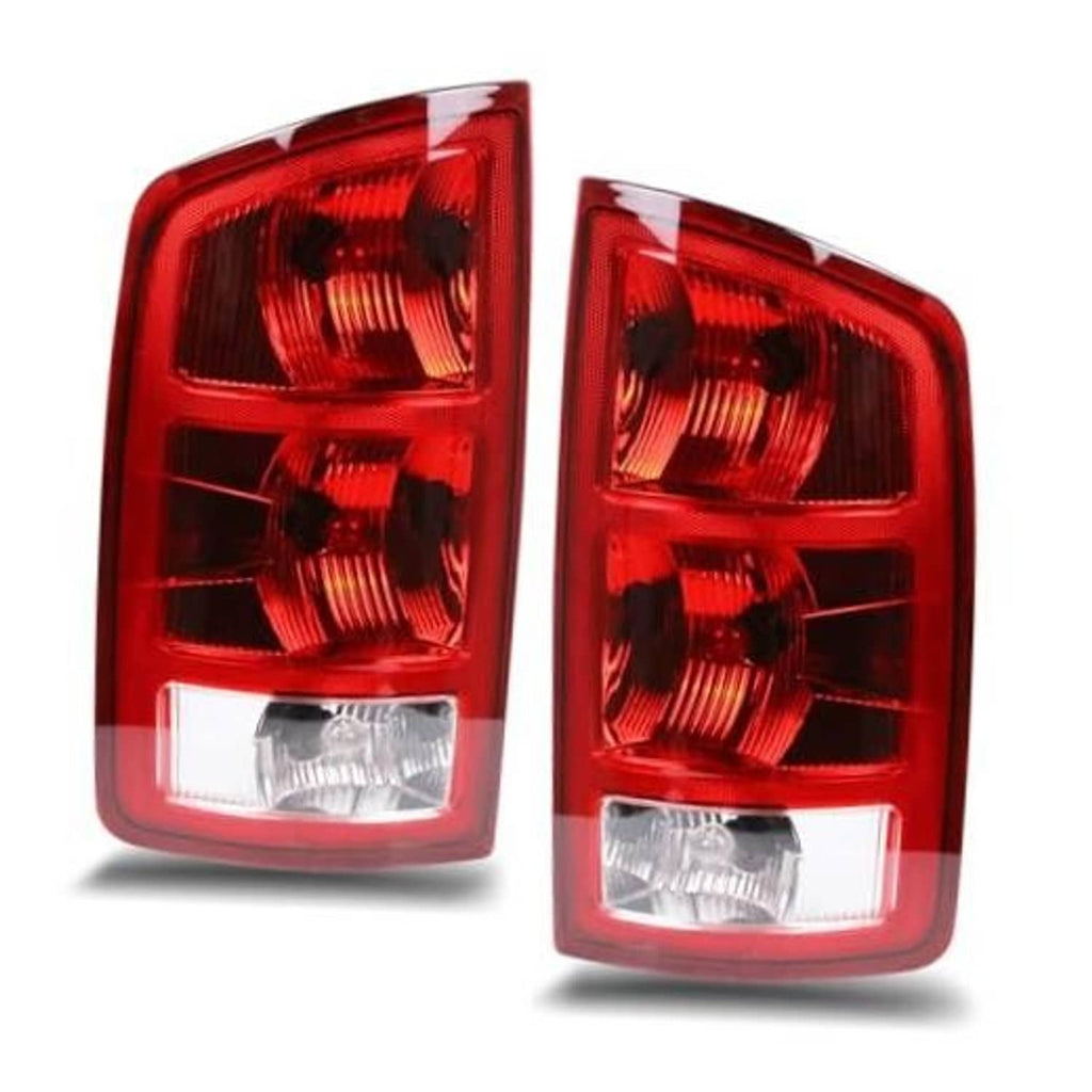 Pair of red rear tail light assemblies with clear lower sections