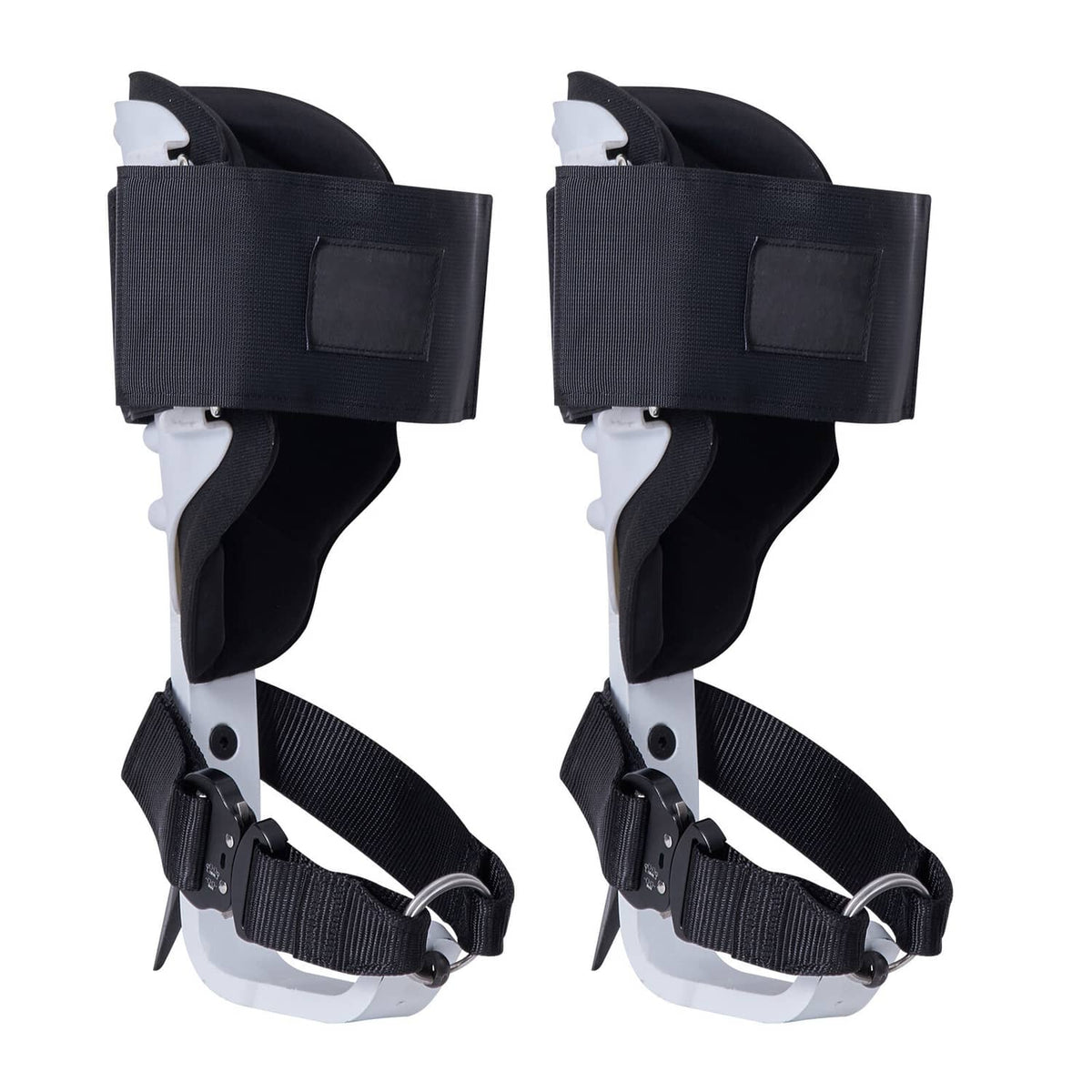 Tree climbing spikes with black leg straps and metal spur tips