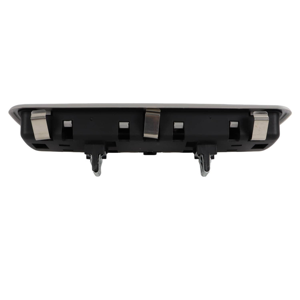 Rear dome light lamp underside with black mounting clips and internal housing openings