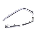 Chrome bumper grille lower trim frame with mounting clips and fastener tabs