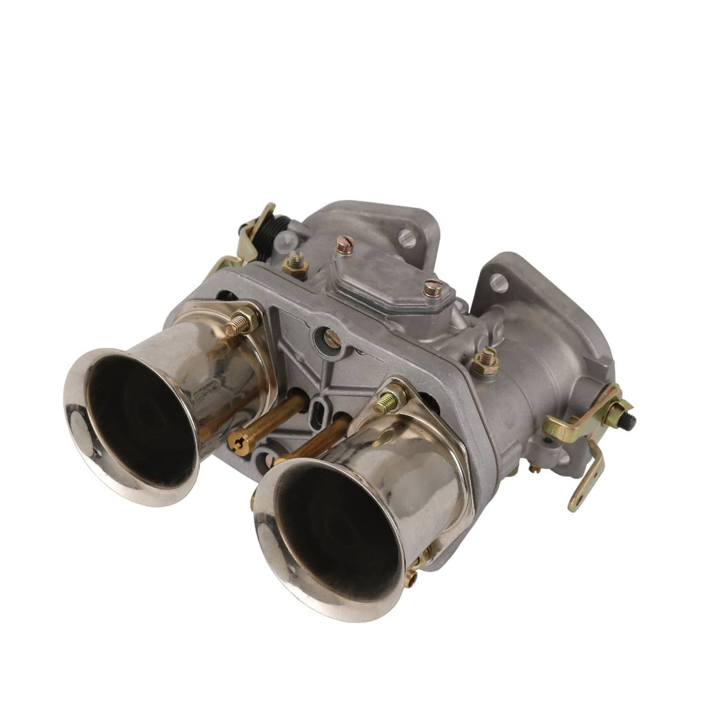 Carburetor assembly showing two rounded intake mouths and gold-toned valve hardware