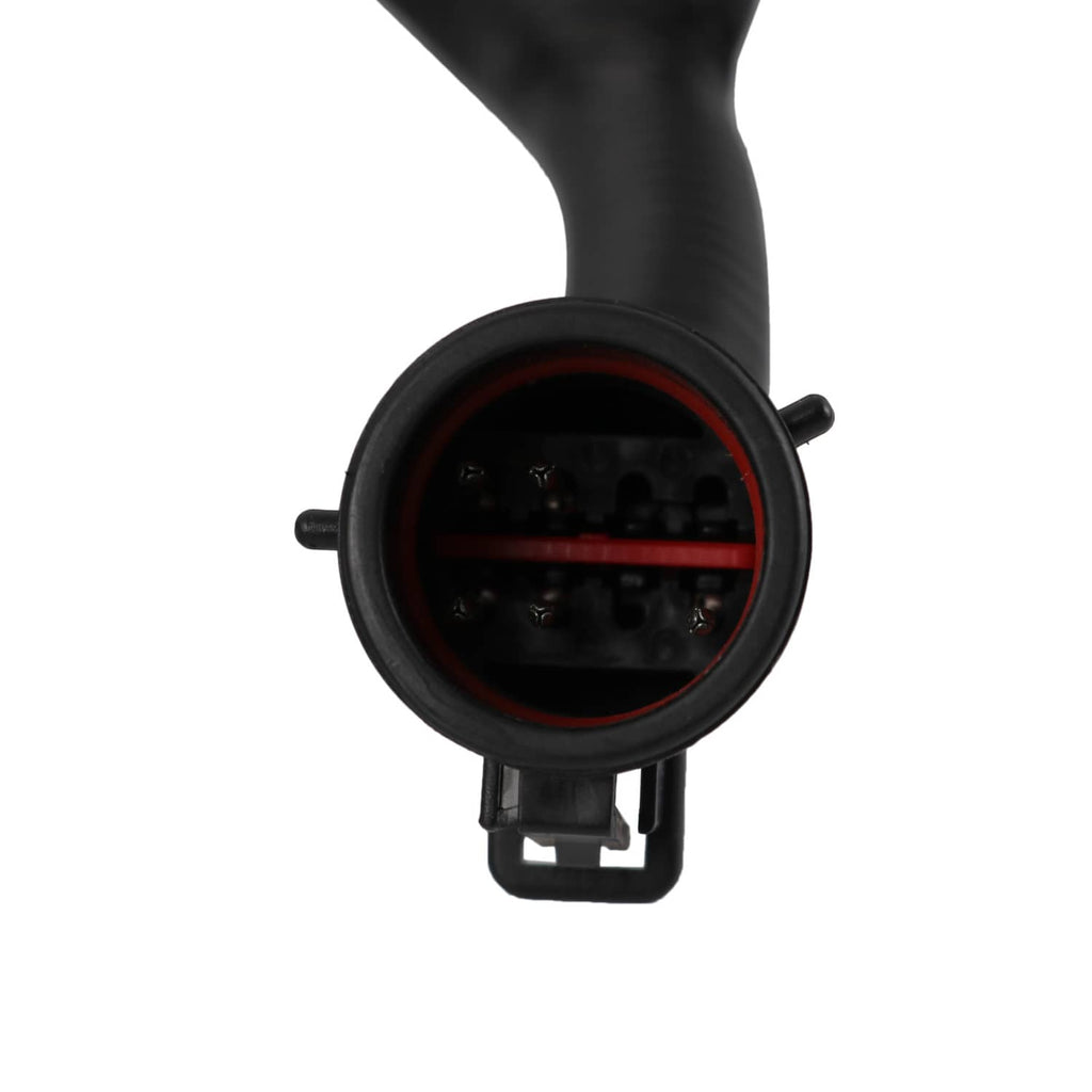 Engine wire harness circular connector with black housing and red-tinted interior contacts