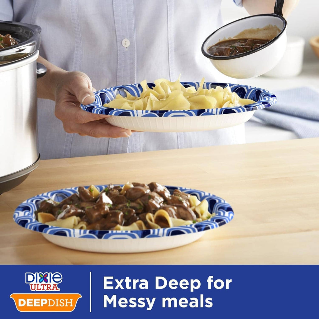 Blue patterned deep dish paper plate holding saucy food, extra-deep bowl shape