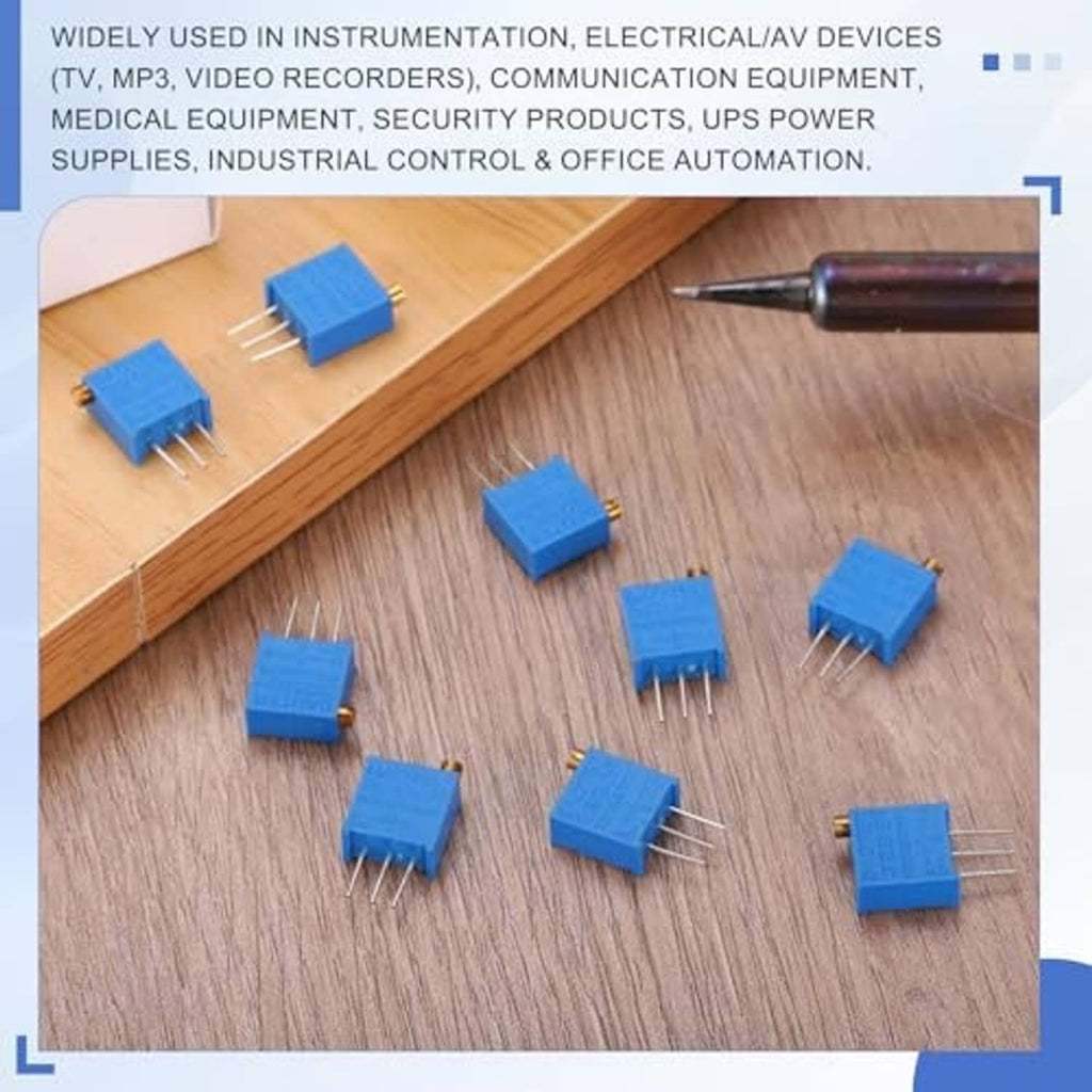Blue multiturn trimmer potentiometers with 3-pin leads on a wooden work surface
