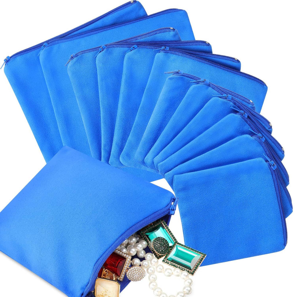 Blue zipper jewelry storage pouch set, stacked with open tops and jewelry items visible
