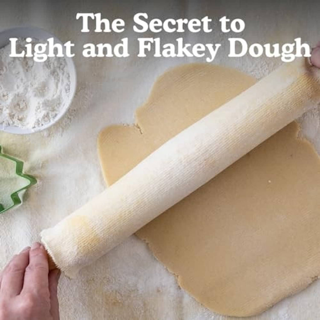 Natural cotton rolling pin cover and pastry cloth, fabric rolled and unrolled