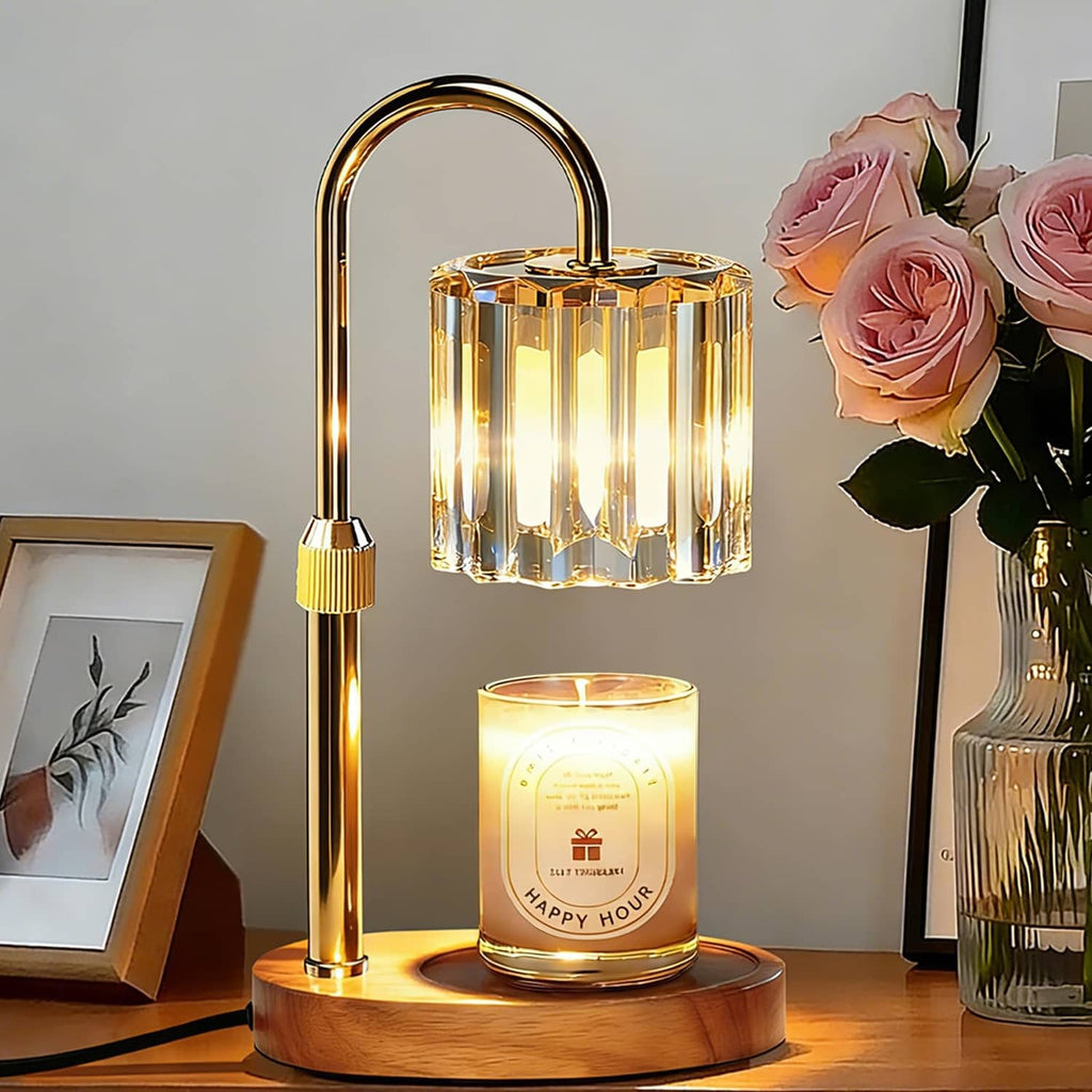 Amber candle warmer lamp with clear glass cylinder, burning candle jar on wooden base