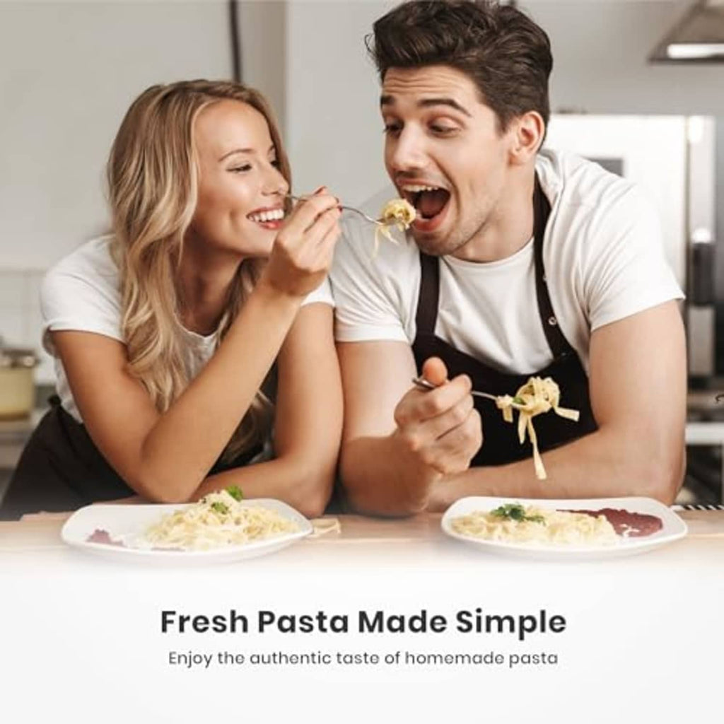 Spaghetti dinner on plates with a couple eating, made using the ISILER pasta maker