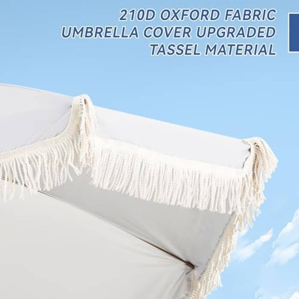 Cream umbrella canopy with stitched fabric and tassel fringe trim