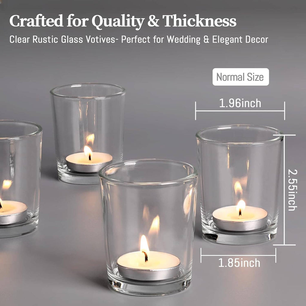 Clear glass tea light votive holders with lit candles, showing front view and height