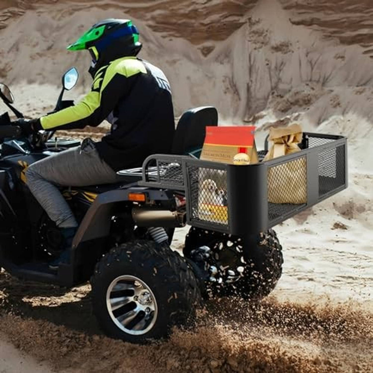 Black steel mesh cargo storage basket mounted on an ATV front rack