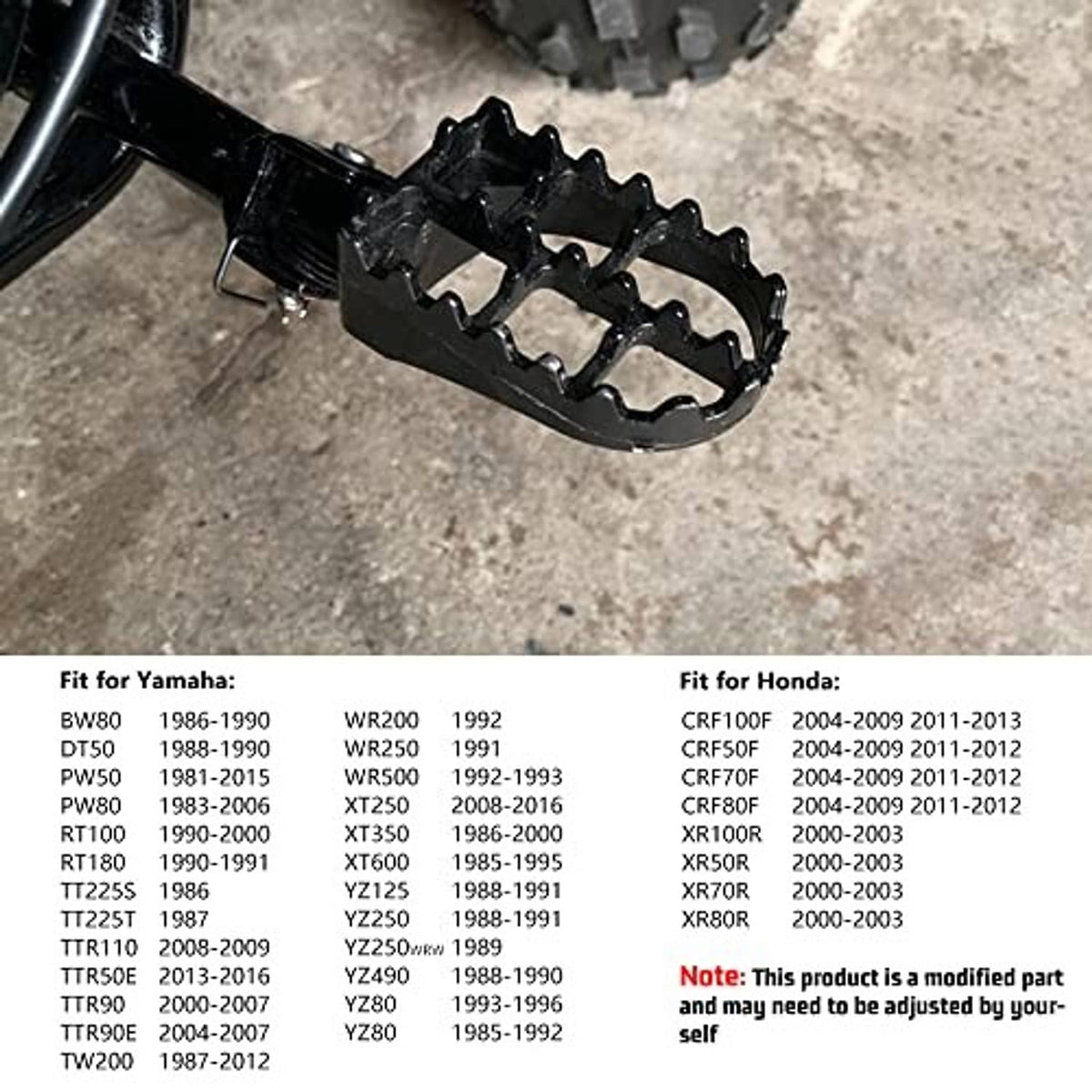 Mounted dirt bike footrests with grip traction studs on a metal frame