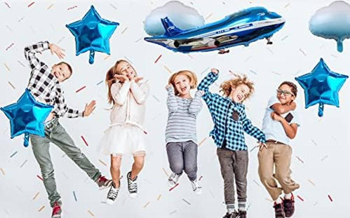 Blue airplane and star balloons with cloud balloons for a birthday party