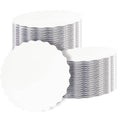 Stack of white round wave cake boards with scalloped edges, 6 in size