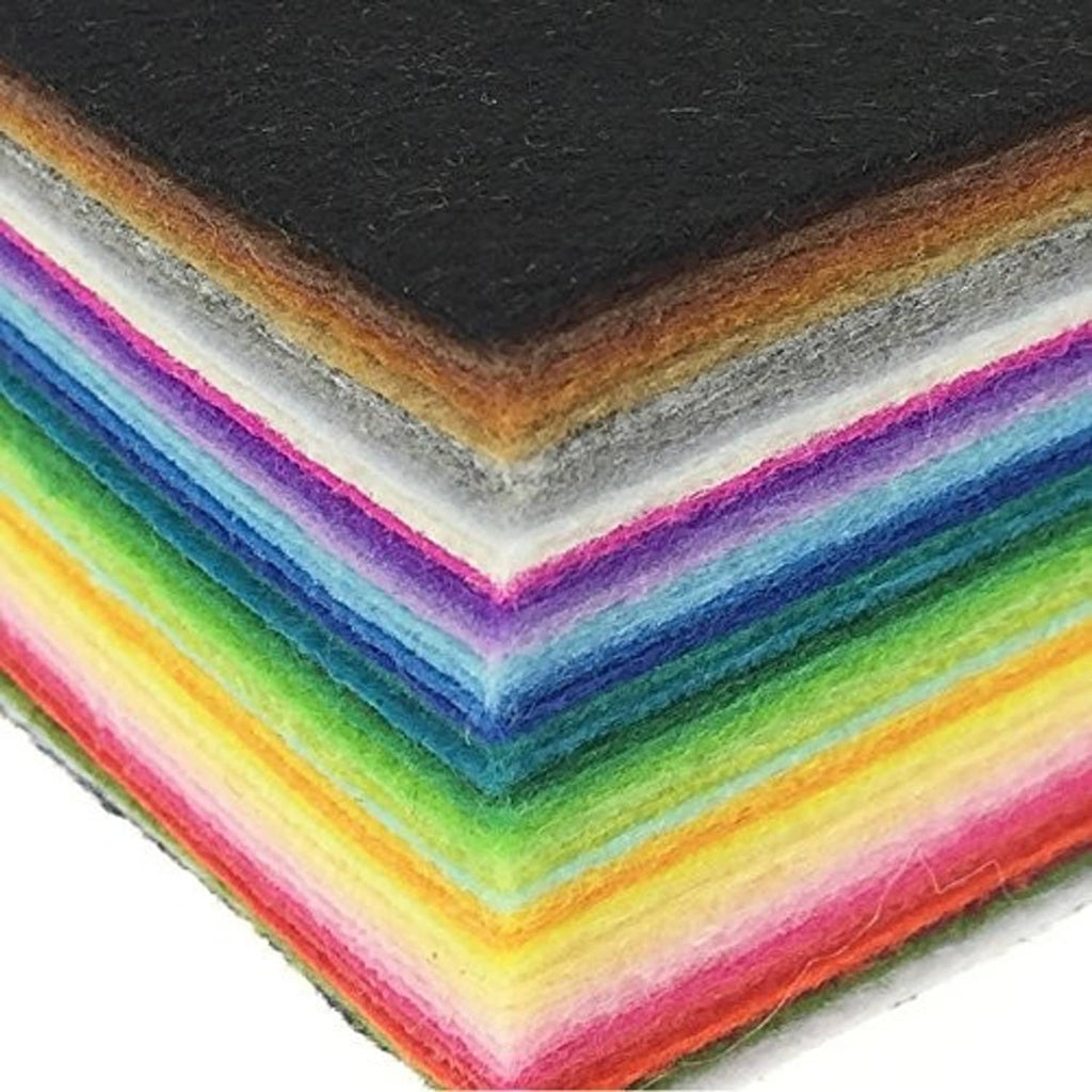 Close-up of stacked felt squares showing layered colors from yellow to pink